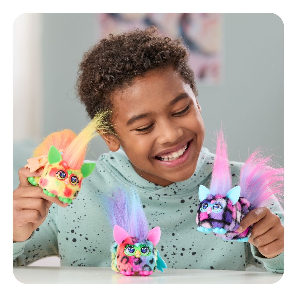 A boy with Furby friends